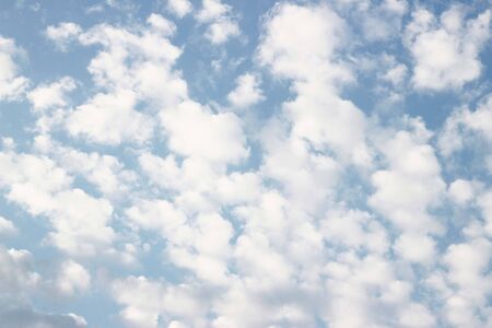 blue sky background with tiny cloudsの写真素材