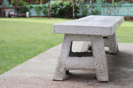 White stone table and chair in the garden of country houseの写真素材