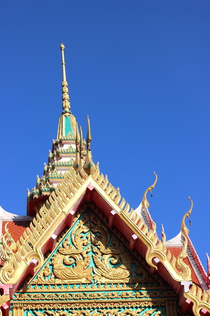 thai temple roof with king of nagas decorationの写真素材