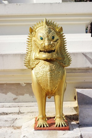 Thai style golden lion in the temple .の写真素材