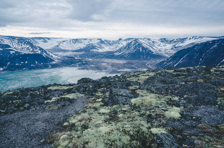 View of the snow-capped mountains. Mount Aykuaivenchorr, Kirovsk, Murmansk Region, Russia.の写真素材