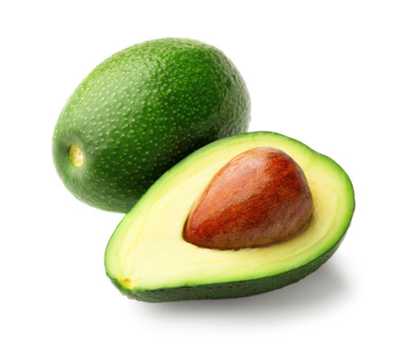 half and whole avocados isolated on white backgroundの写真素材