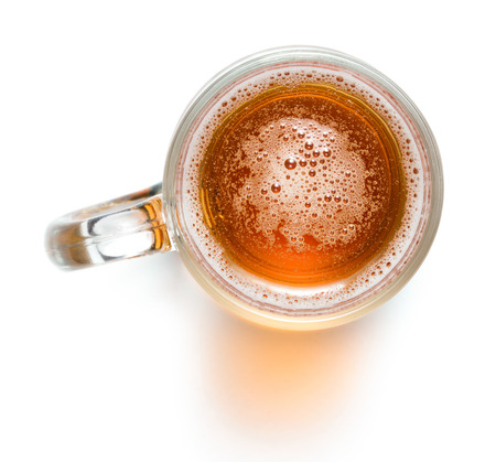 top view of glass of beer isolated on white backgroundの写真素材