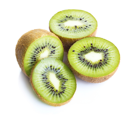 heap of ripe kiwi slices isolated on white backgroundの写真素材
