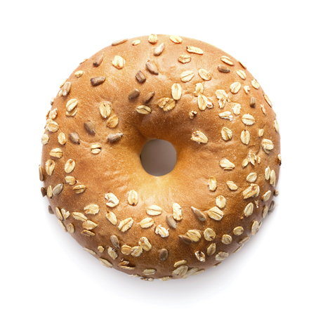 single fresh baked bagel isolated on whtie backgroundの写真素材