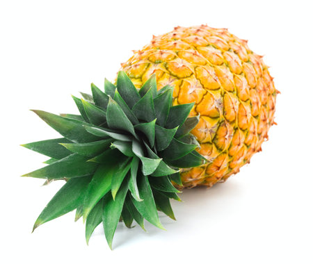 single pineapple laying isolated on white background
