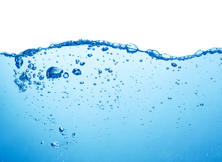 clean blue water surface with splash, ripple and air bubbles underwater on white backgroundの写真素材