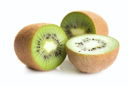 heap of ripe kiwi slices isolated on white backgroundの写真素材