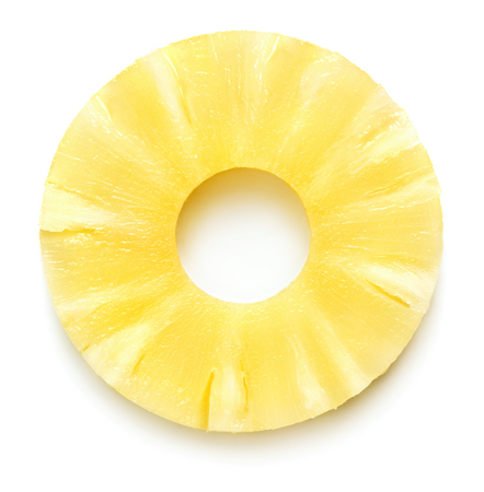 heap of fresh ripe pineapple fruit slices isolated on white backgroundの写真素材