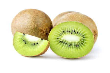 heap of ripe kiwi slices isolated on white backgroundの写真素材