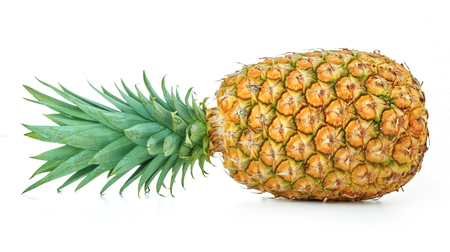 single ripe whole pineapple with green leaves isolated on white backgroundの写真素材