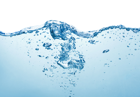 clean blue water surface with splash, ripple and air bubbles underwater on white backgroundの写真素材