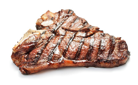grilled t-bone beef steak isolated on white backgroundの写真素材