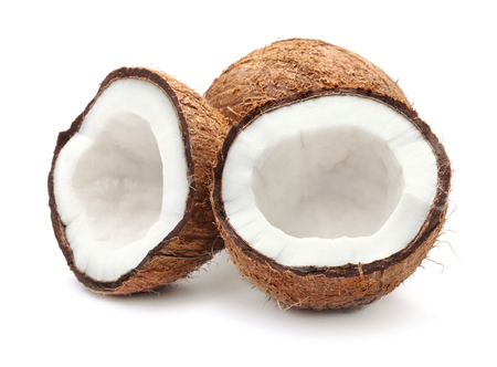 halves of cracked coconut isolated on white backgroundの写真素材