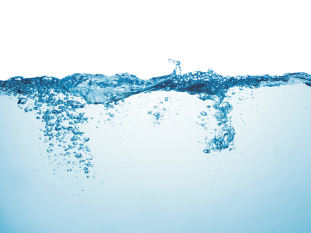 clean blue water surface with splash, ripple and air bubbles underwater on white backgroundの写真素材