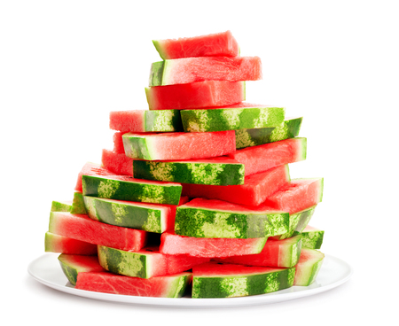 heap of ripe watermelon slices isolated on white backgroundの写真素材