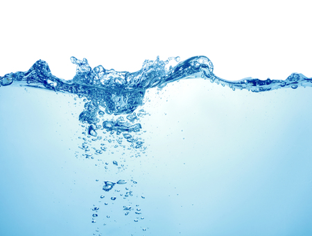 clean blue water surface with splash, ripple and air bubbles underwater on white backgroundの写真素材