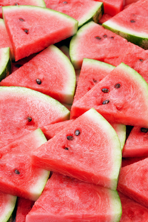 heap of ripe watermelon slicesの写真素材