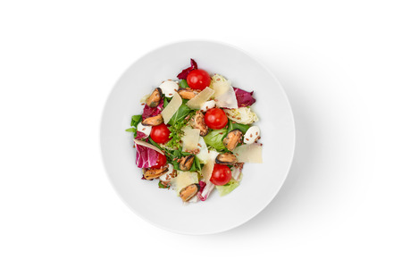top view of white bowl with salad isolated on white backgroundの写真素材