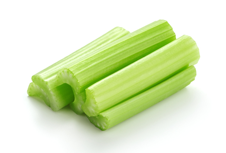 heap of fresh celery sticks isolated on white backgroundの写真素材