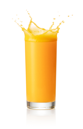 orange juice in glass isolated on white backgroundの写真素材