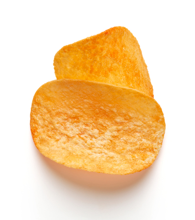 heap of potato chips isolated on white backgroundの写真素材