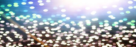 Blurred backdrop, blurred background, circle blur, bokeh blur from the light shining through as a backdrop and beautiful computer screen images.の写真素材