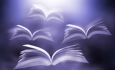 A fancy book concept page that flew out of the book with magical power.の写真素材