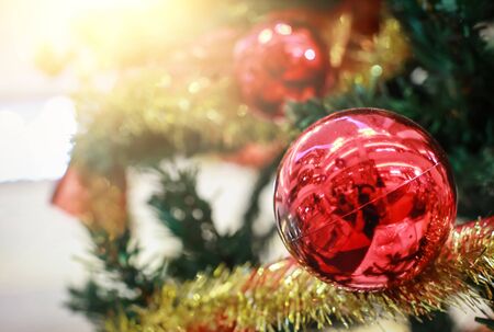 Blurry of Christmas and New Year's balls with beautiful decorations on the Christmas tree, soft light, beautiful background images and illustrations.の写真素材