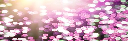 Blurred backdrop, blurred background, circle blur, bokeh blur from the light shining through as a backdrop and beautiful computer screen images.の写真素材