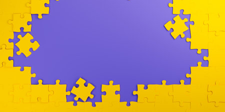 Yellow puzzle pieces frame a purple background.の写真素材