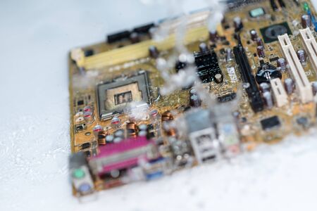 Main board computer motherboard cpu  close up ic surface mount device on mainboard circuitの写真素材