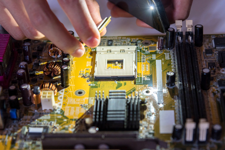 A mainboard ( Main board,cpu motherboard,logic board,system board or mobo board) close up of electronics circuit boardの写真素材