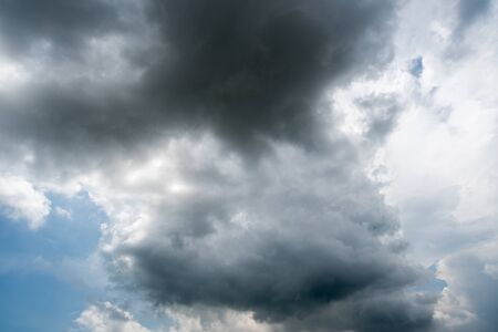 clear blue sky background,clouds with background,dark storm cloudsの写真素材