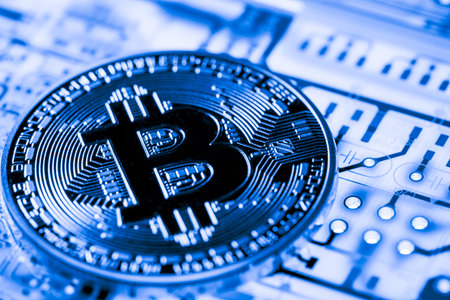 Abstract,Golden Bitcoin money on computer.の写真素材