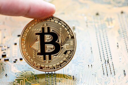 Abstract,Golden Bitcoin money on computer.