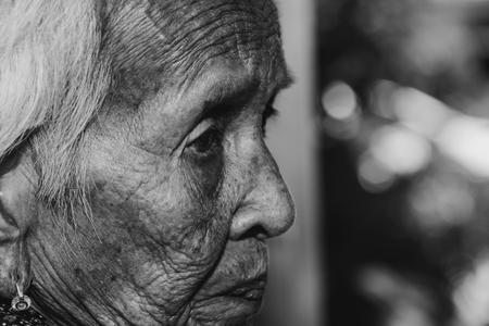 The old woman's felling lonely. ,she's senior woman in family and the elderly.の写真素材