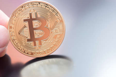 Golden Bitcoin money on computer.の写真素材