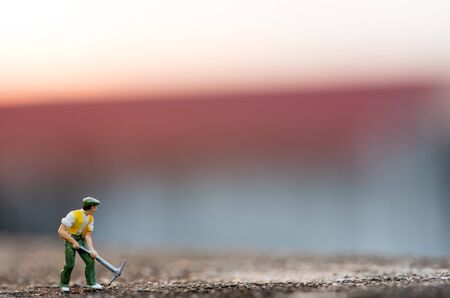 people mining on sky sunset background.の写真素材