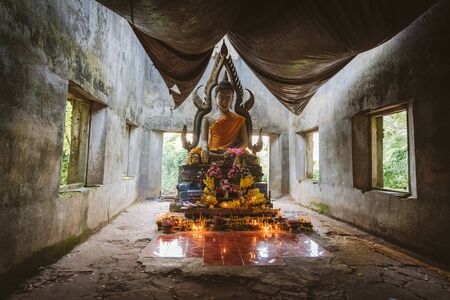 Temple and the ancient Buddha in Thailand.の写真素材
