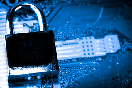 Abstract,close up of Lock on Mainboard Electronic computer background. (best internet top security)の写真素材