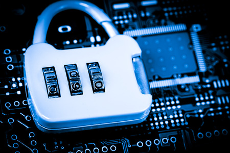 Abstract,close up of Lock on Mainboard Electronic computer background. (best internet top security)の写真素材