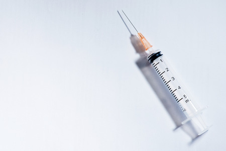 hypodermic needle(injection needle) on white backgroundの写真素材