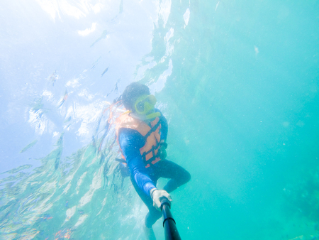 snorkeling on island in the Thailand Ocean.の写真素材