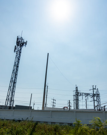 high voltage pole on sky sunset background.