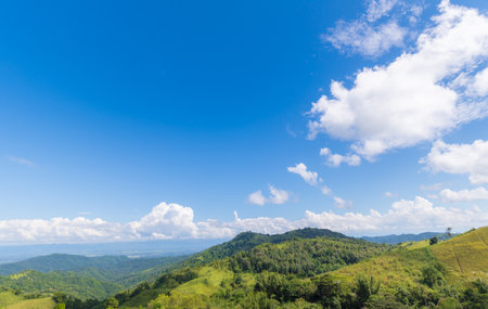 Panoramic view of clear blue sky and clouds, Blue sky background with tiny clouds. White fluffy clouds in the blue sky.の写真素材