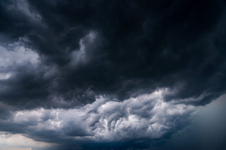 <p>Dark clouds before a thunder-storm. Dark clouds before a thunder-storm.</p>