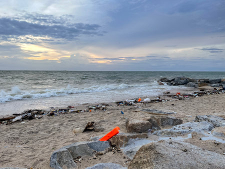 Dirty sea sandy shore ,Environmental pollution,
Plastic water bottles pollution in oceanの写真素材