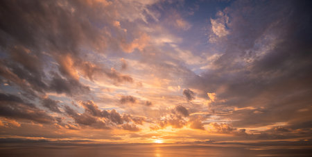 Panoramic view of clear blue sky and clouds, Blue sky background with tiny clouds. White fluffy clouds in the blue sky. Captivating stock photo featuring the mesmerizing beauty ofの写真素材