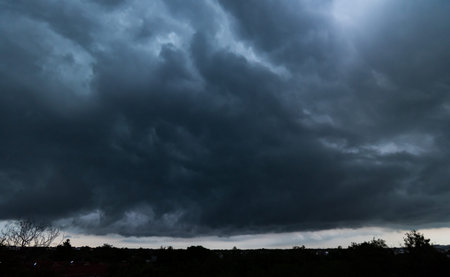 Dark sky with stormy clouds. Dramatic sky rain,Dark clouds before a thunder-storm.